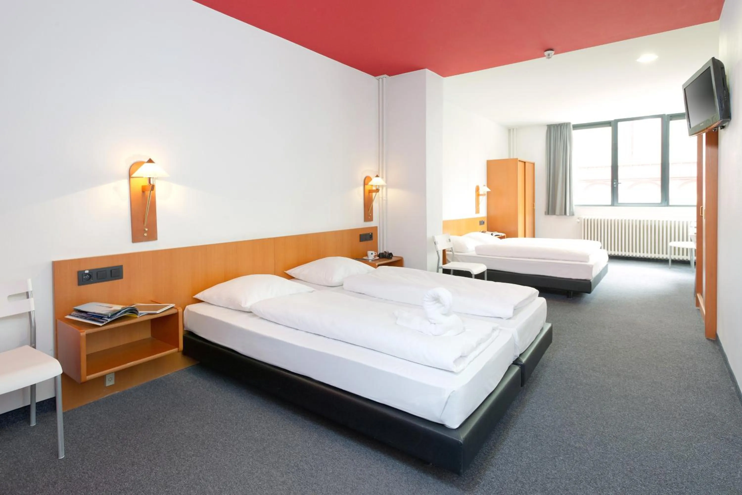 Photo of the whole room, Bed in a&o Antwerpen Centraal