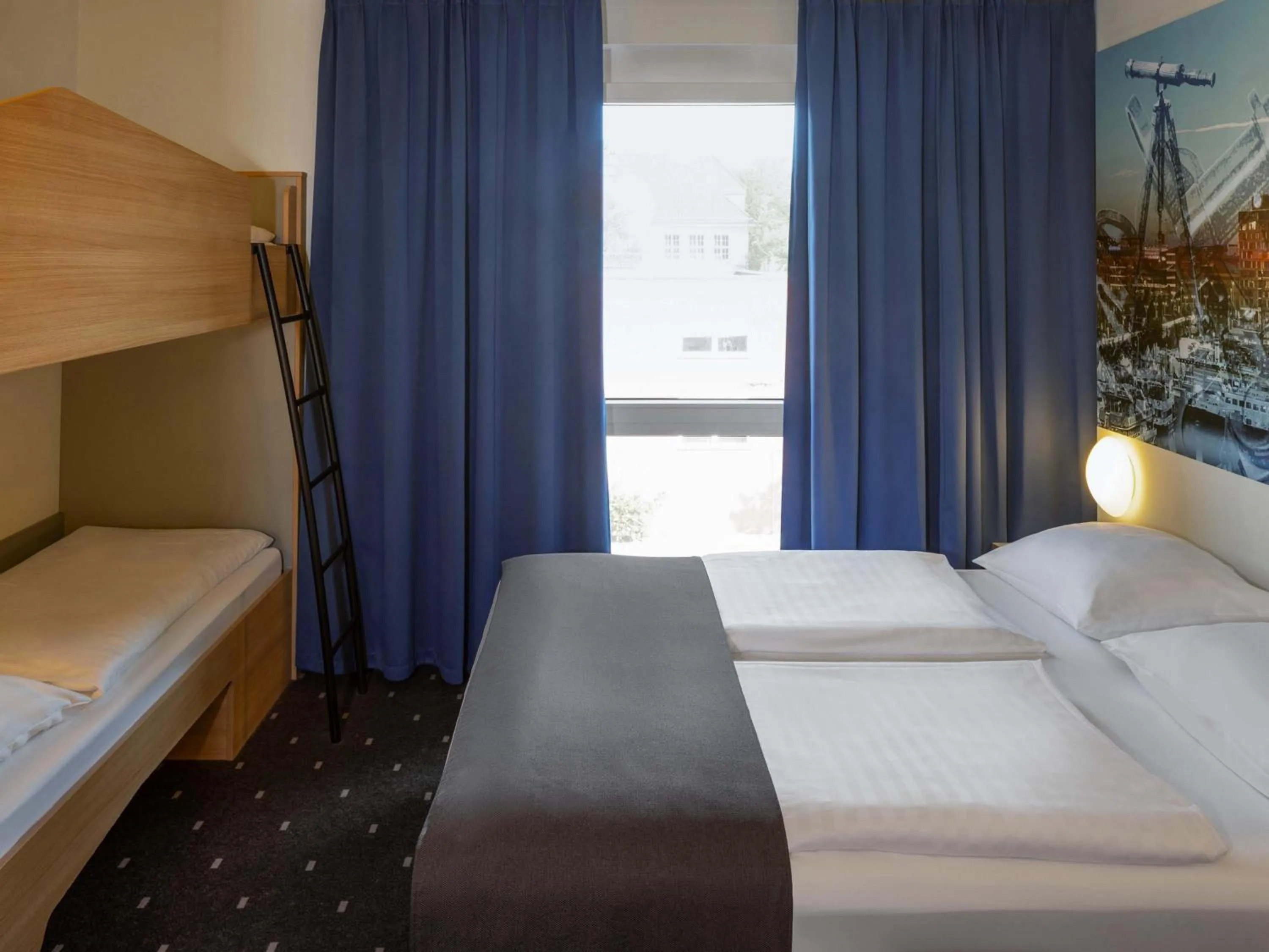 Photo of the whole room, Bed in B&B Hotel Kiel-Wissenschaftspark