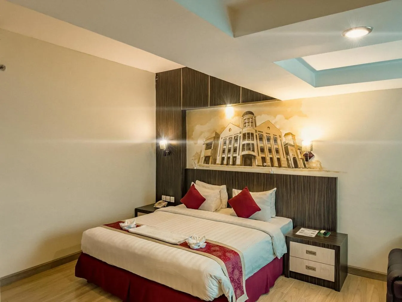 Bed in Hermes Palace Hotel Medan