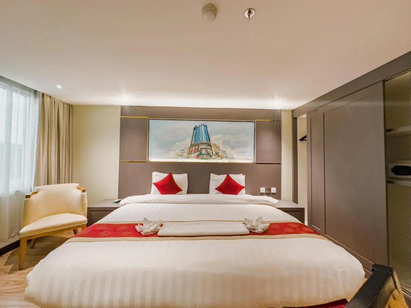 Bed in Hermes Palace Hotel Medan