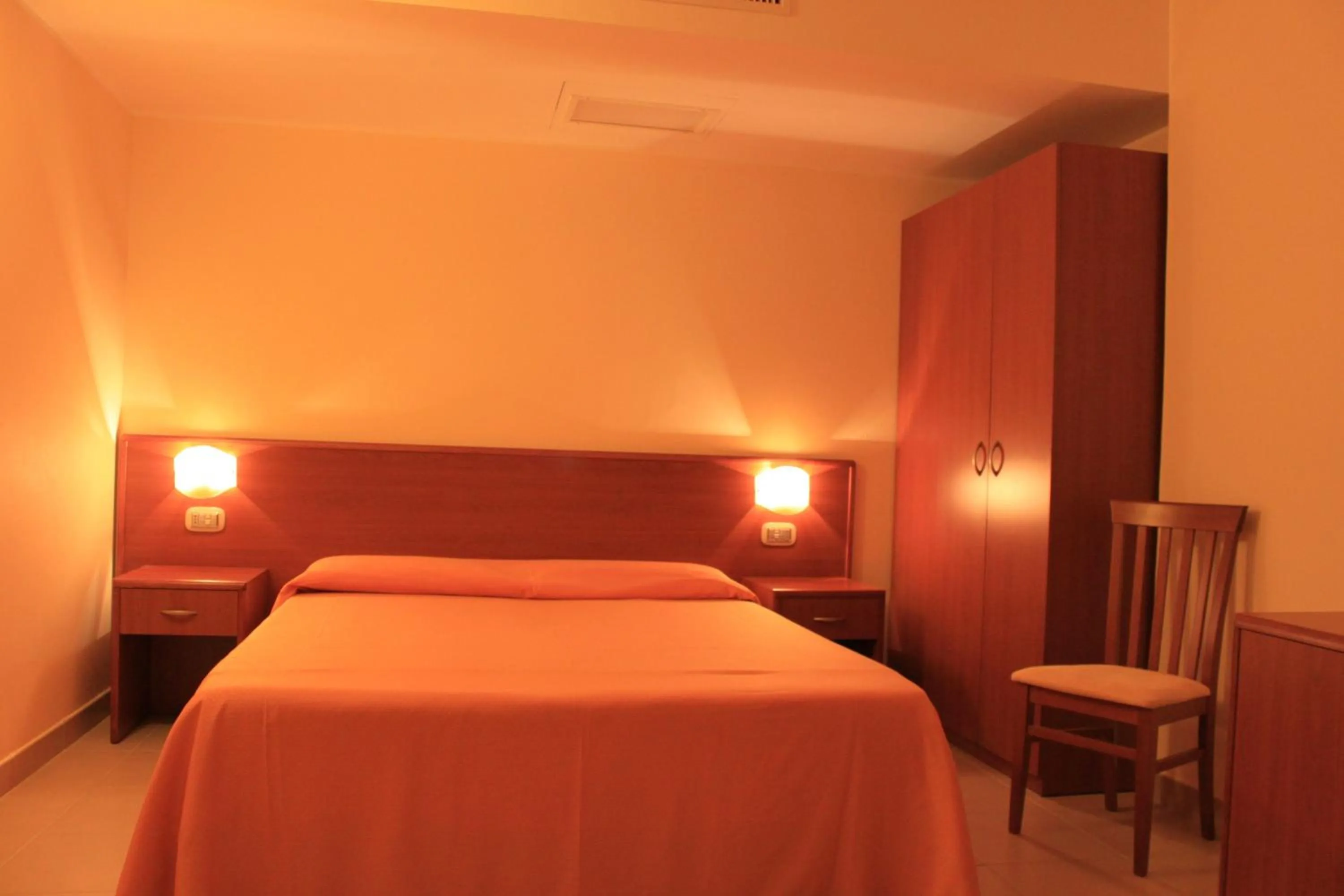 Bed in Hotel Sette E Mezzo
