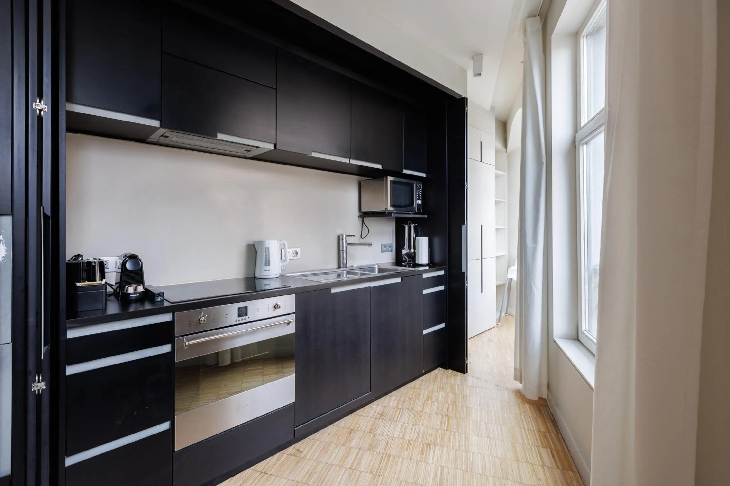 Kitchen or kitchenette in Sweett - Regence