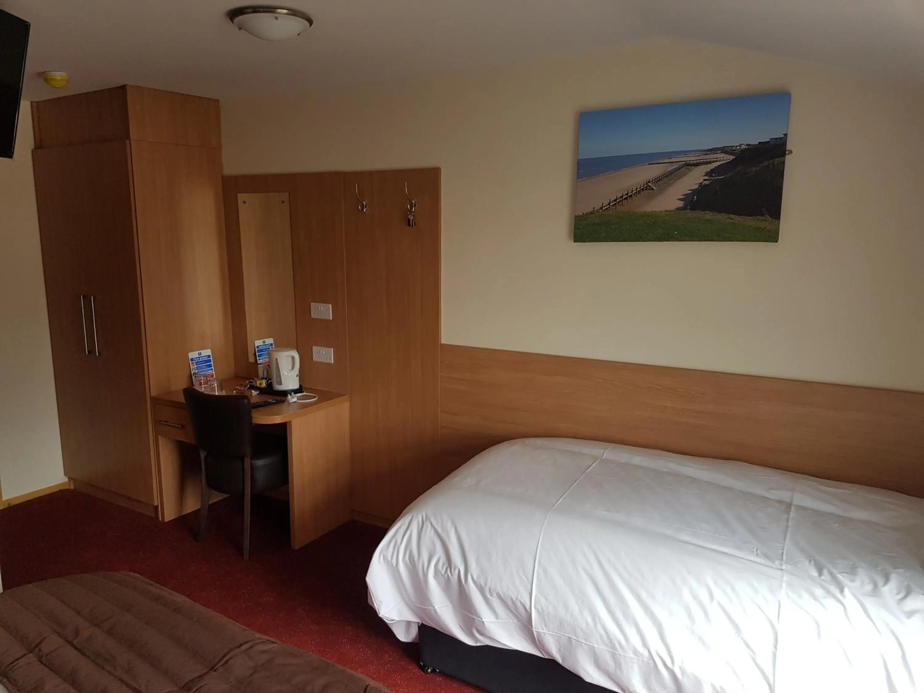 Bed in The Cliff Top Inn