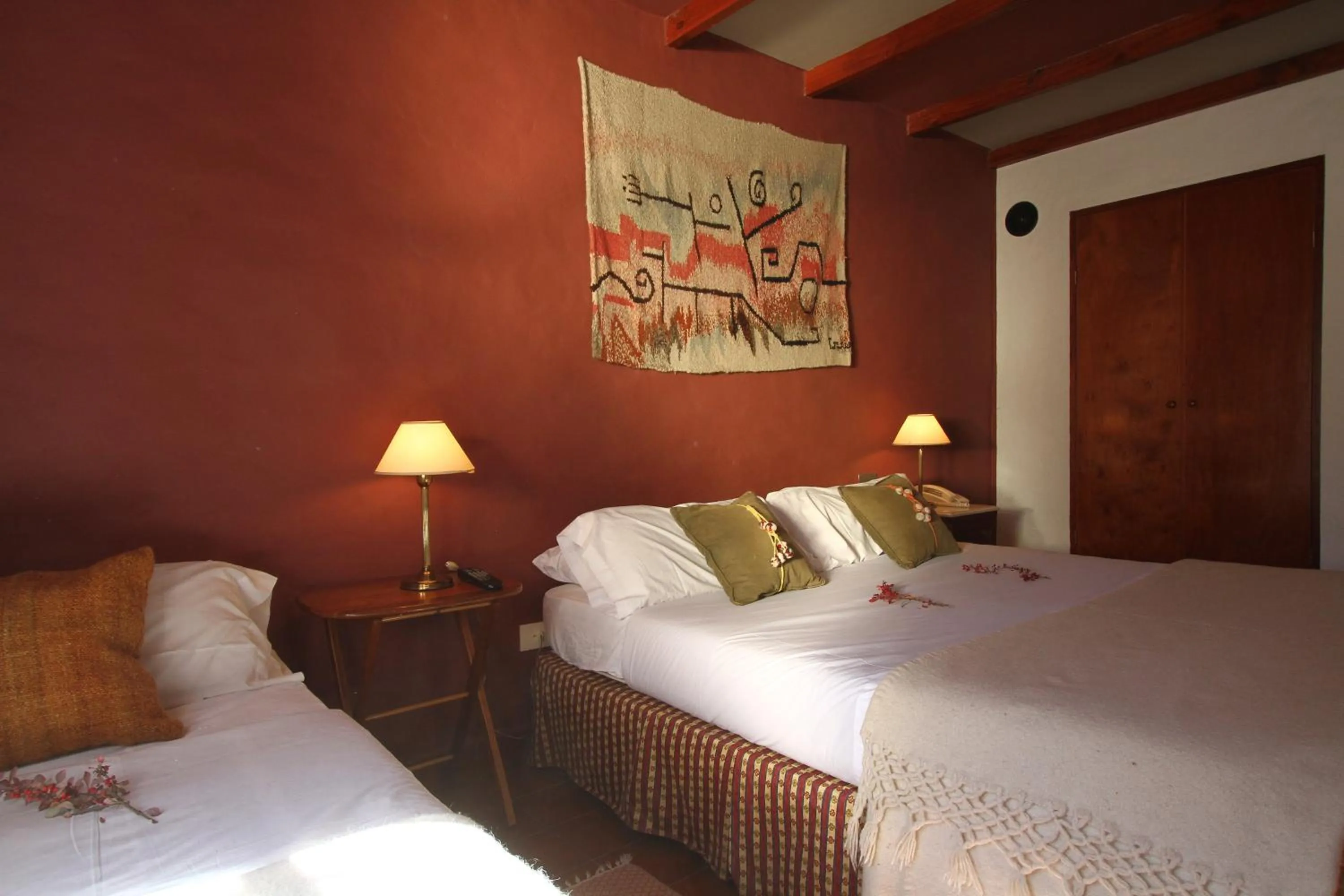 Photo of the whole room, Bed in Hostería Lunahuana