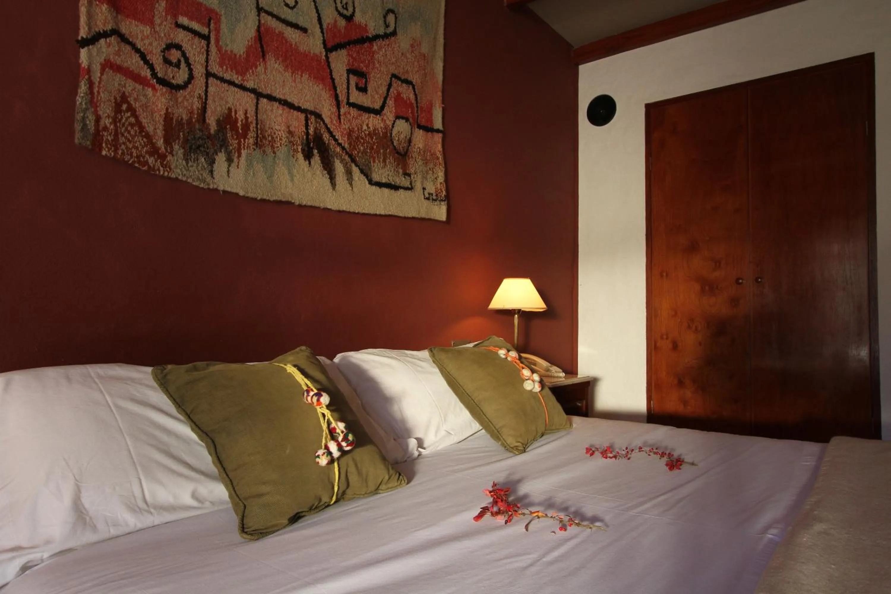Photo of the whole room, Bed in Hostería Lunahuana