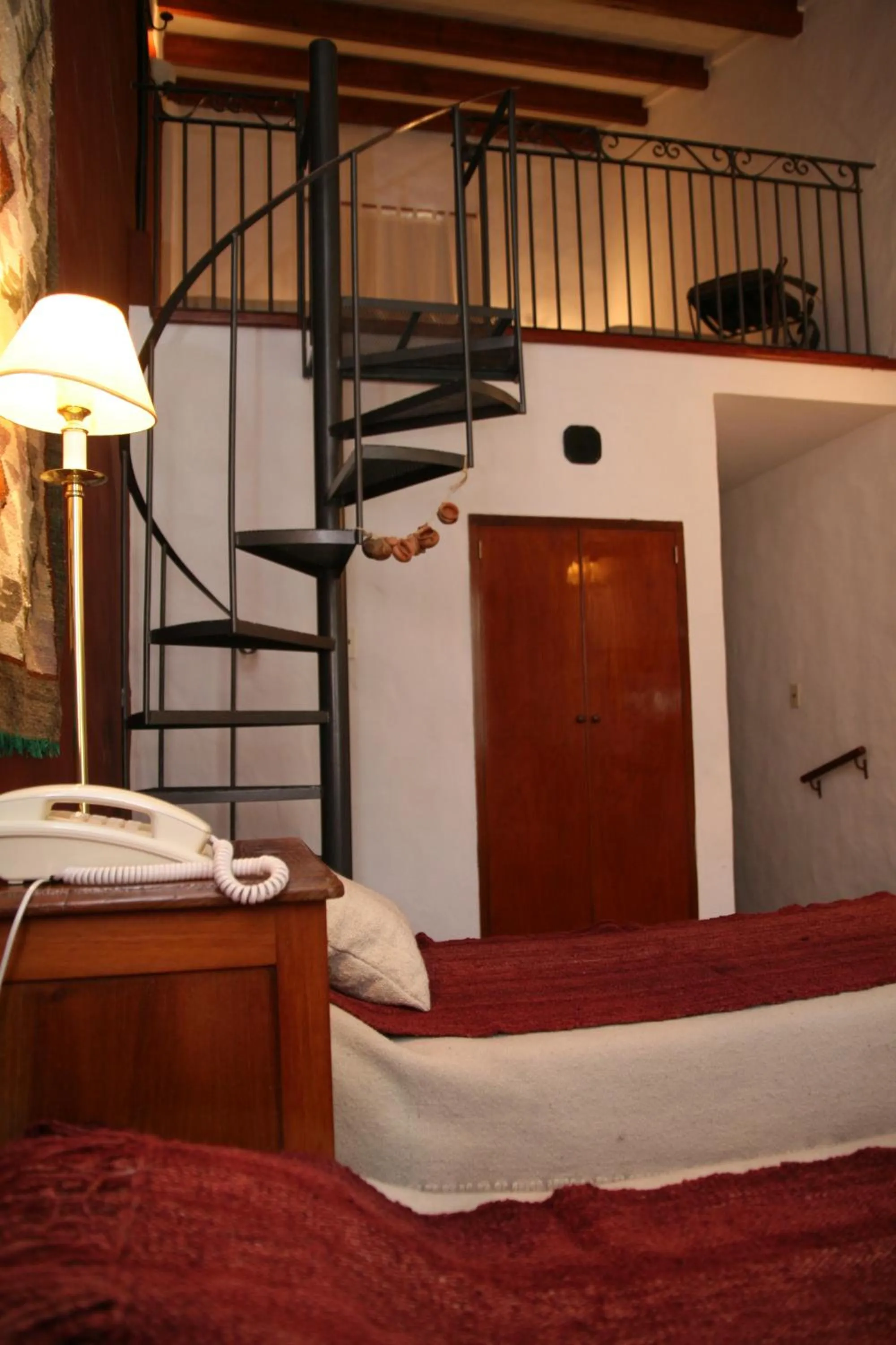 Photo of the whole room, Bed in Hostería Lunahuana