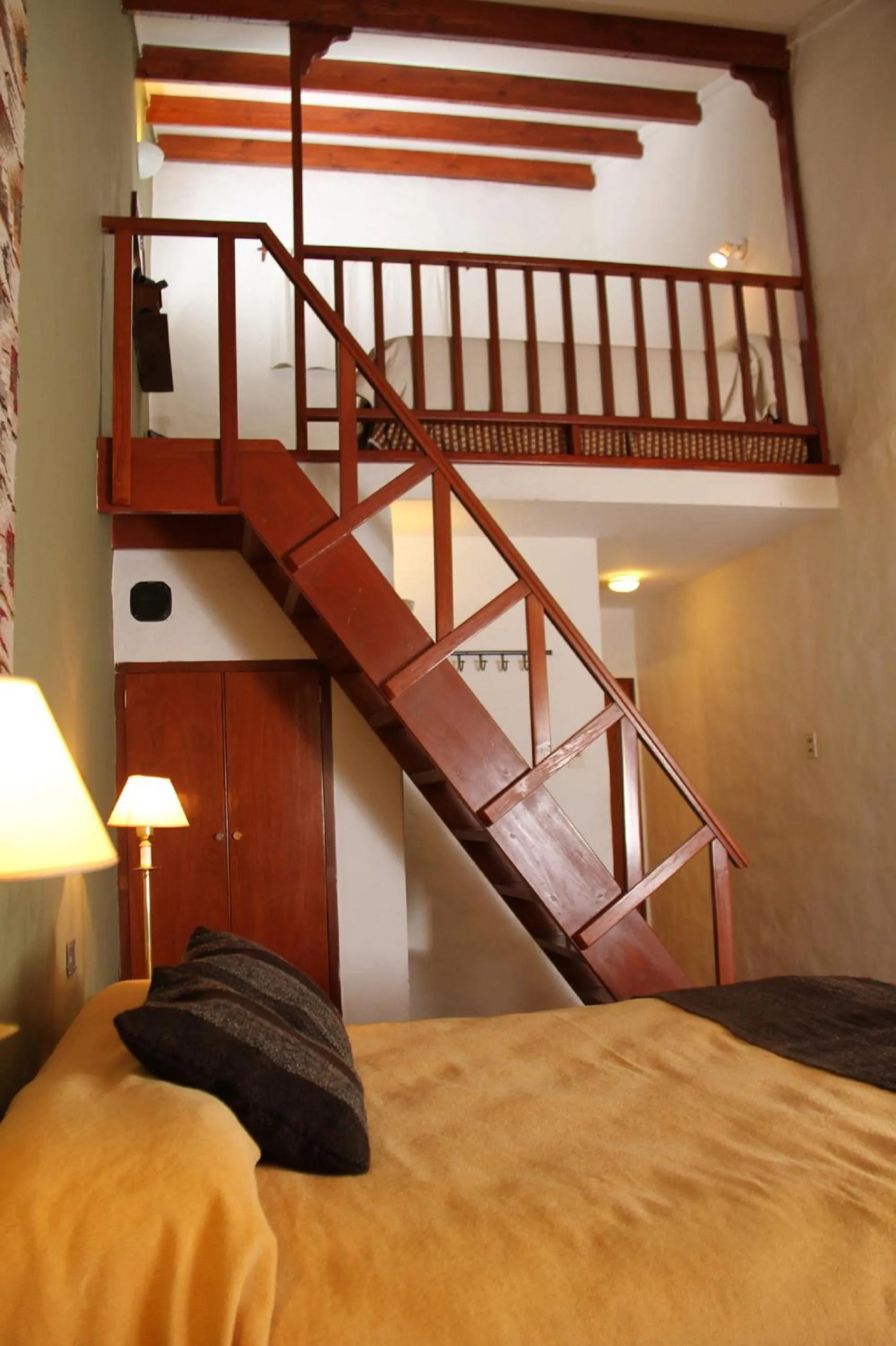 Photo of the whole room, Bed in Hostería Lunahuana