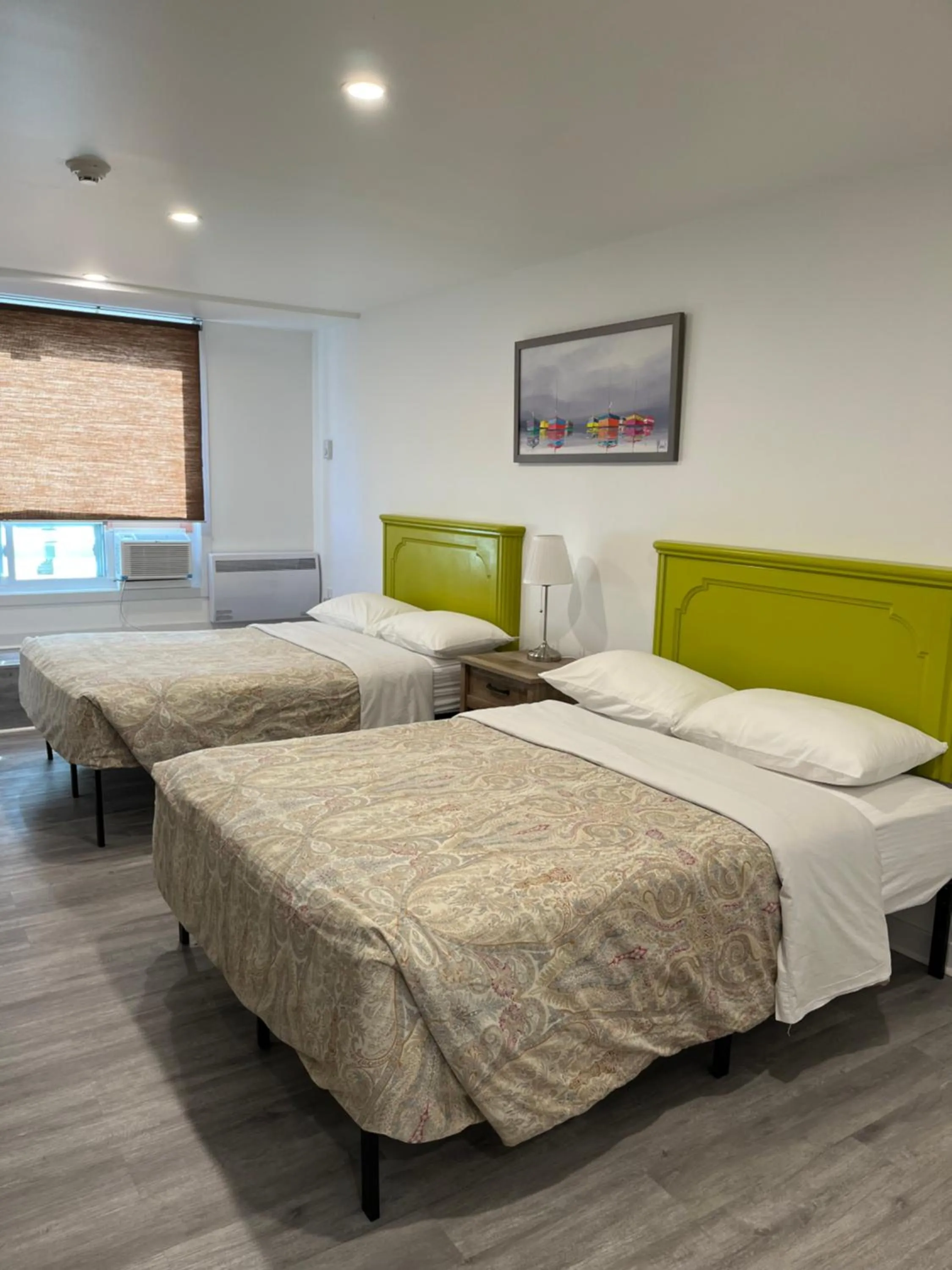 Bed in Hotel Bon Accueil