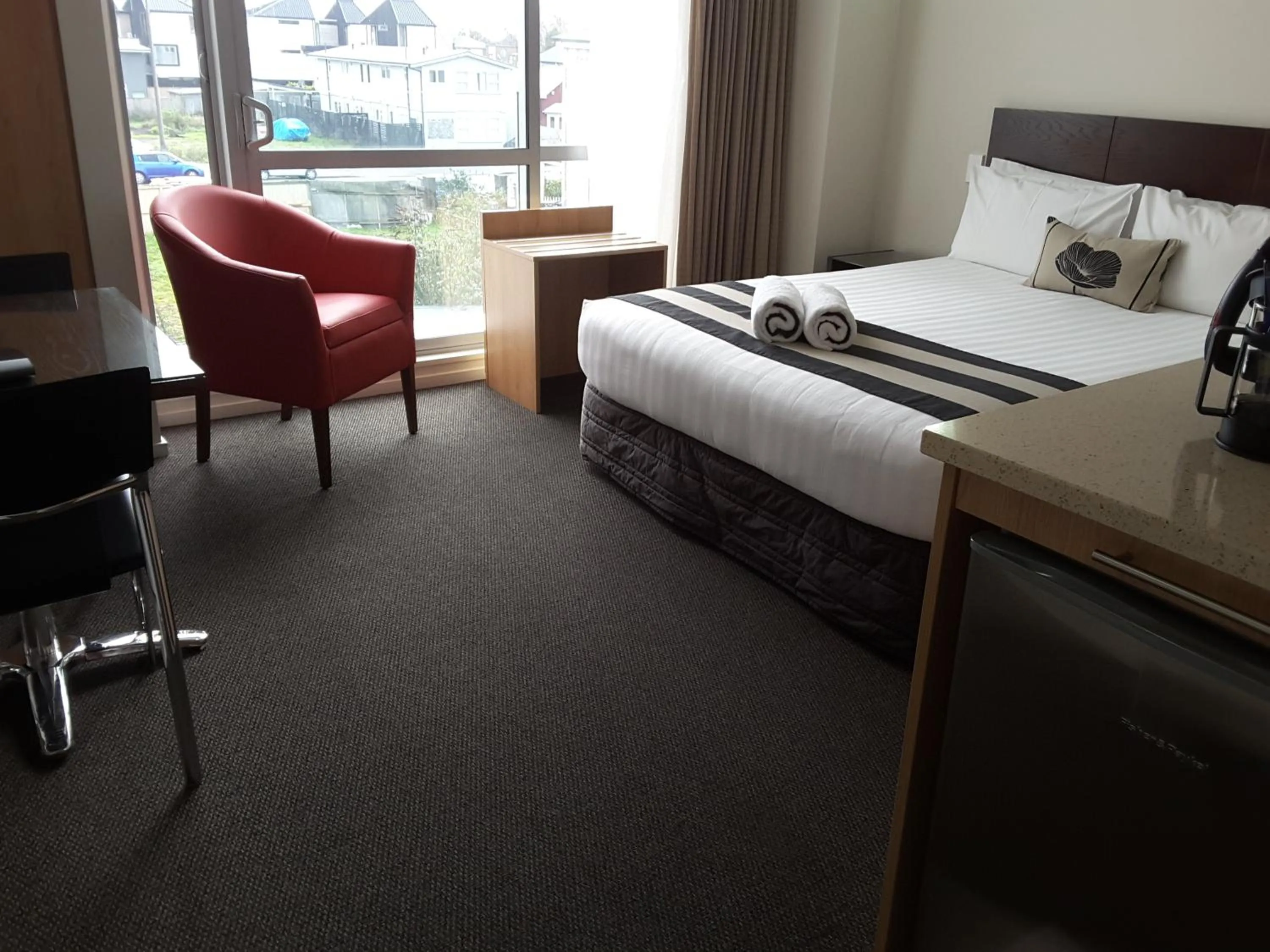 Photo of the whole room, Bed in Focus Motel