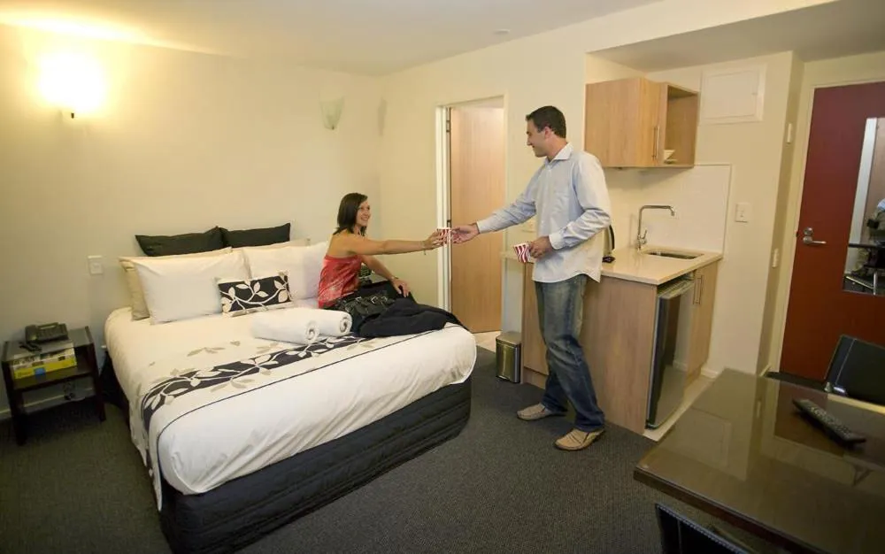 Photo of the whole room, Bed in Focus Motel