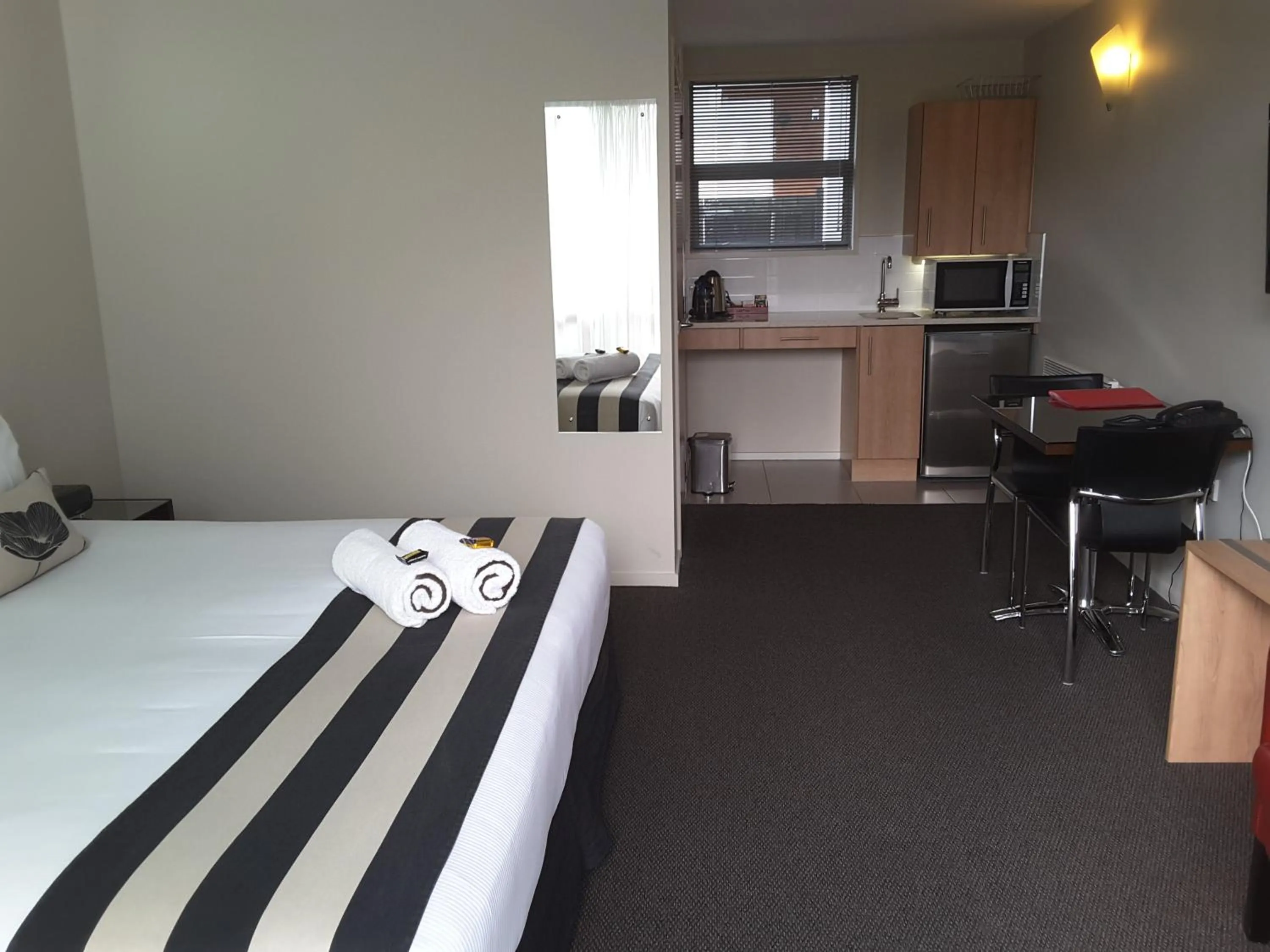 Photo of the whole room, Bed in Focus Motel