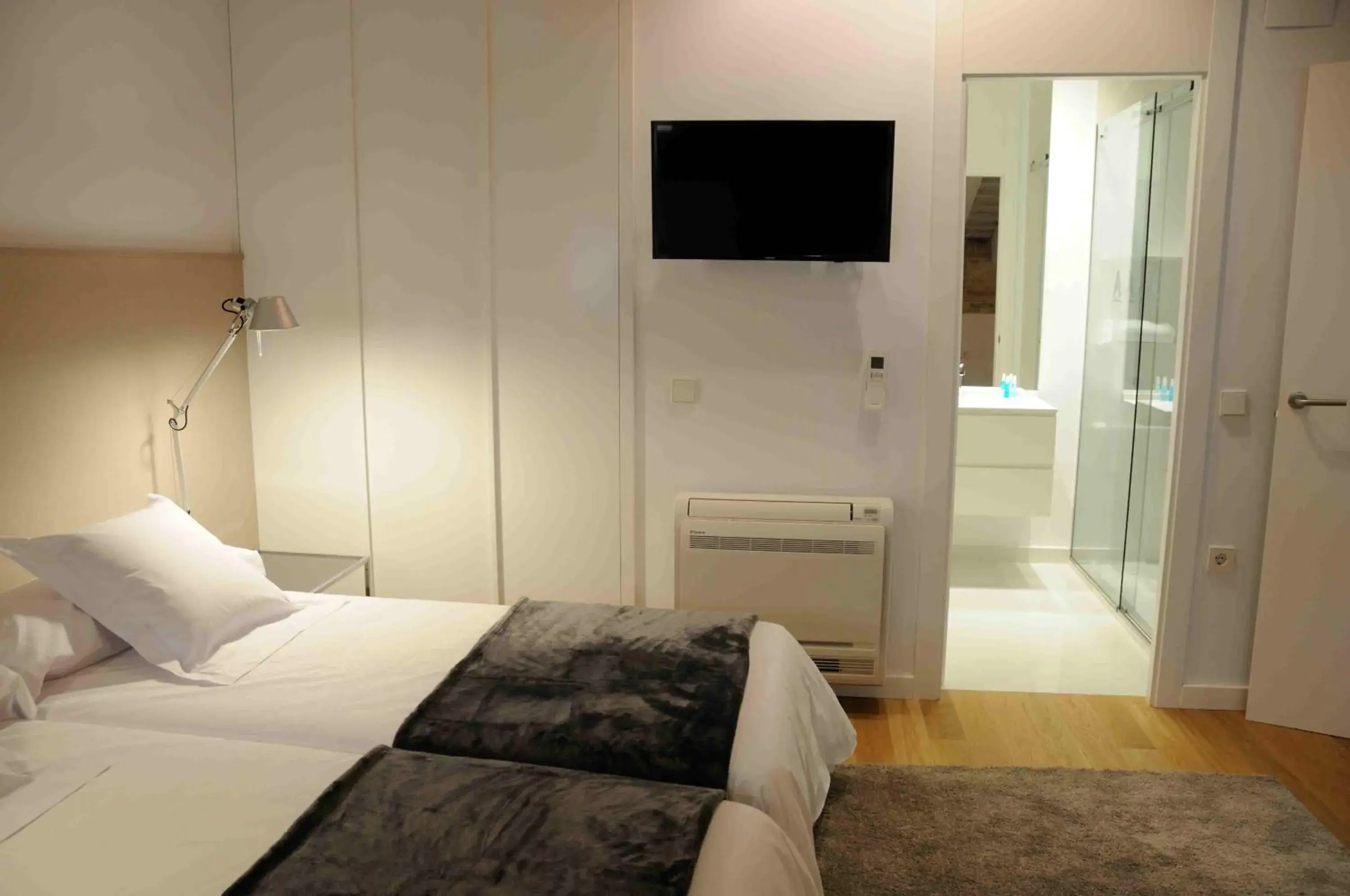 Bed in Mon Suites San Martin Bed in Mon Suites San Martin