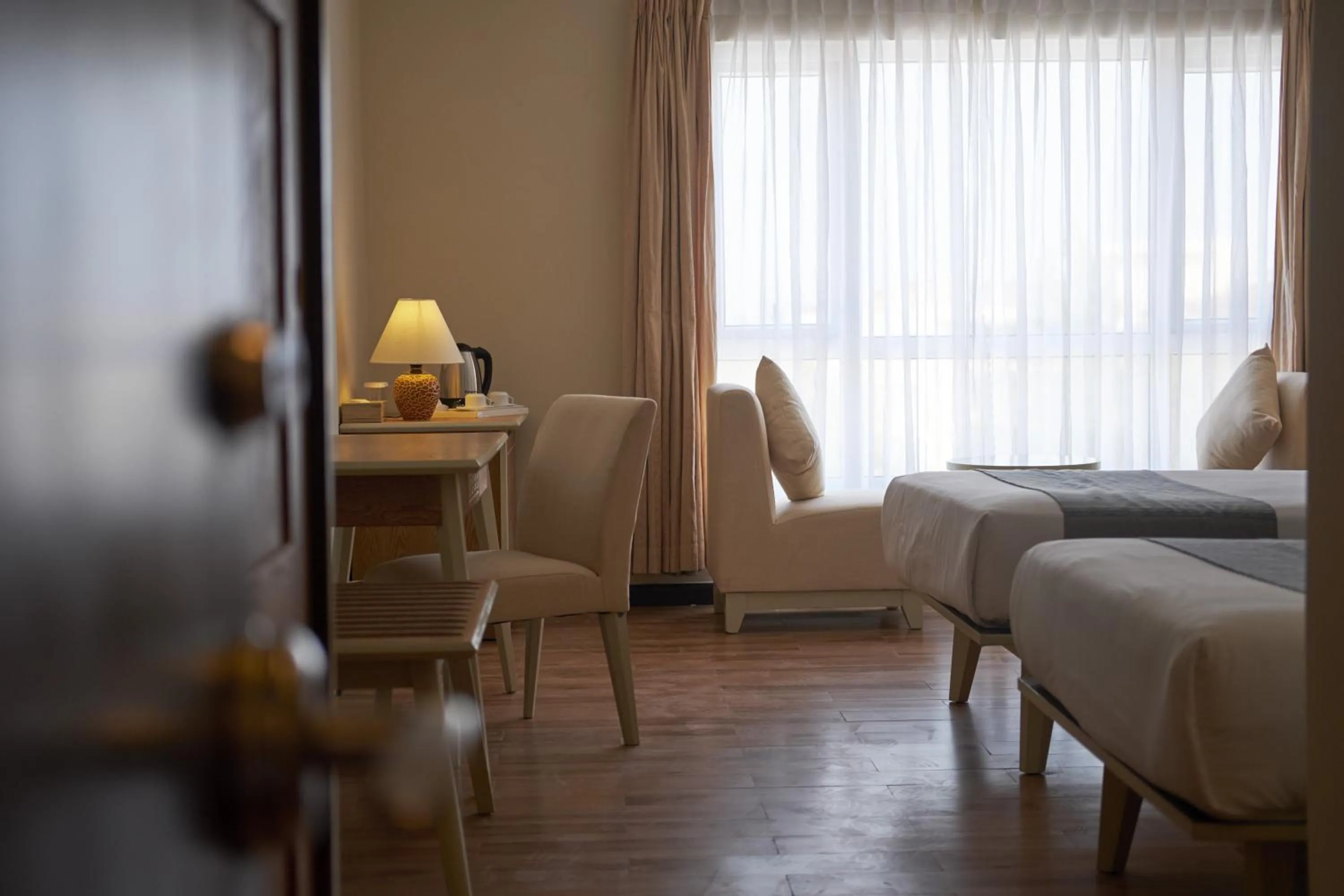 Seating area, Bed in Sandy Beach Non Nuoc Resort