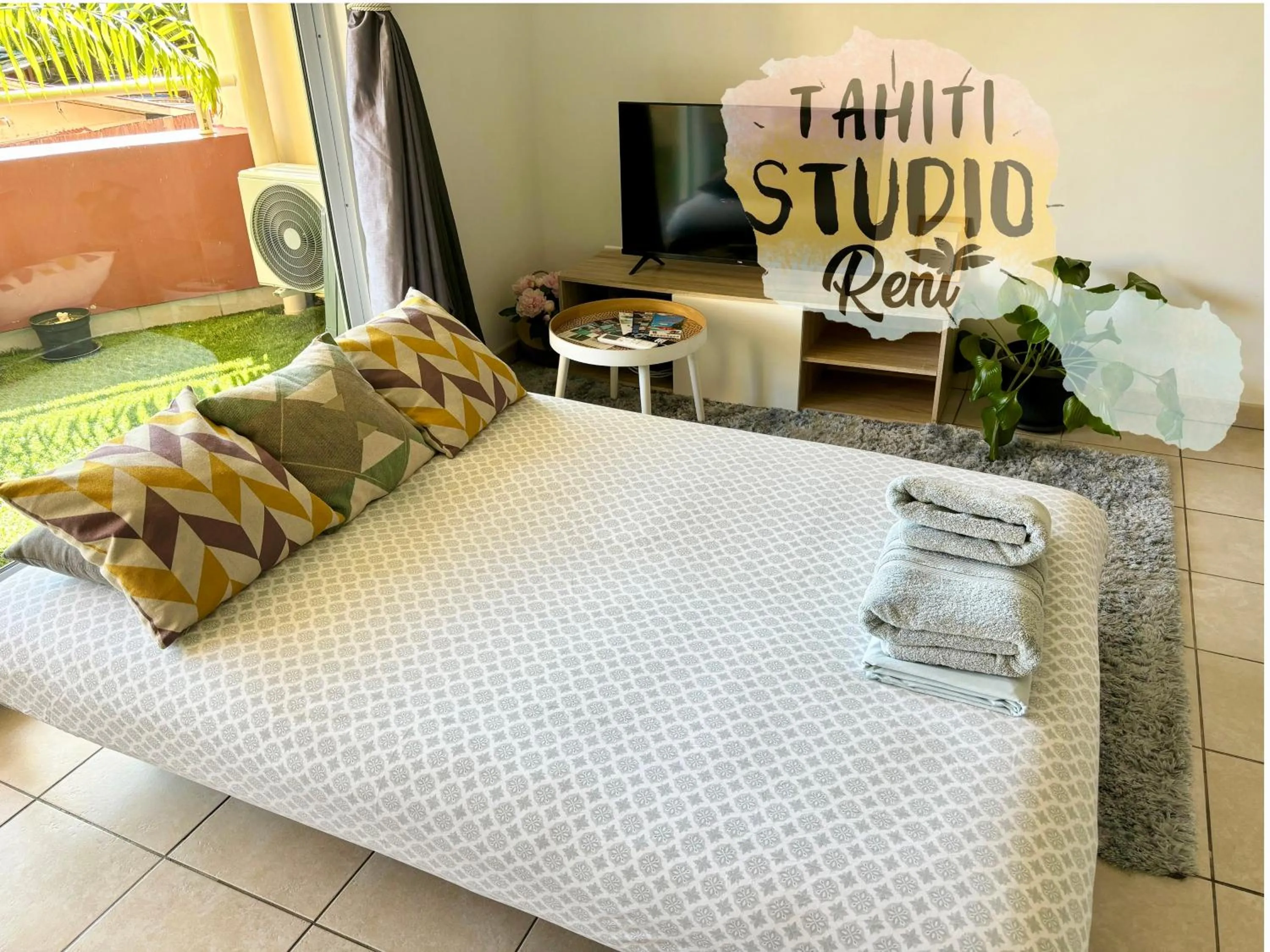 Bed in Studio Kaoha Nui - Private apartment