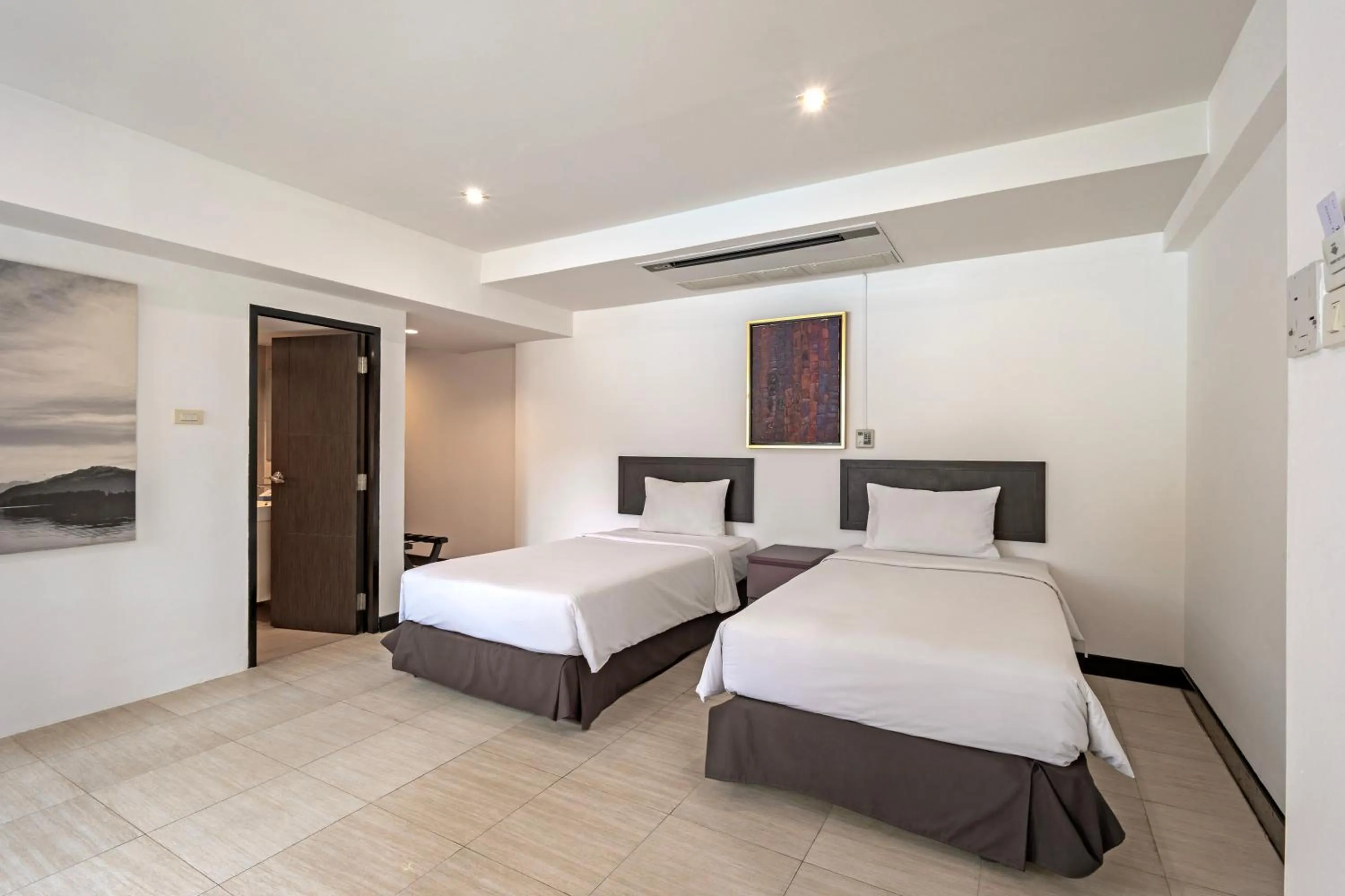 Bed in Hotel Tropicana Pattaya