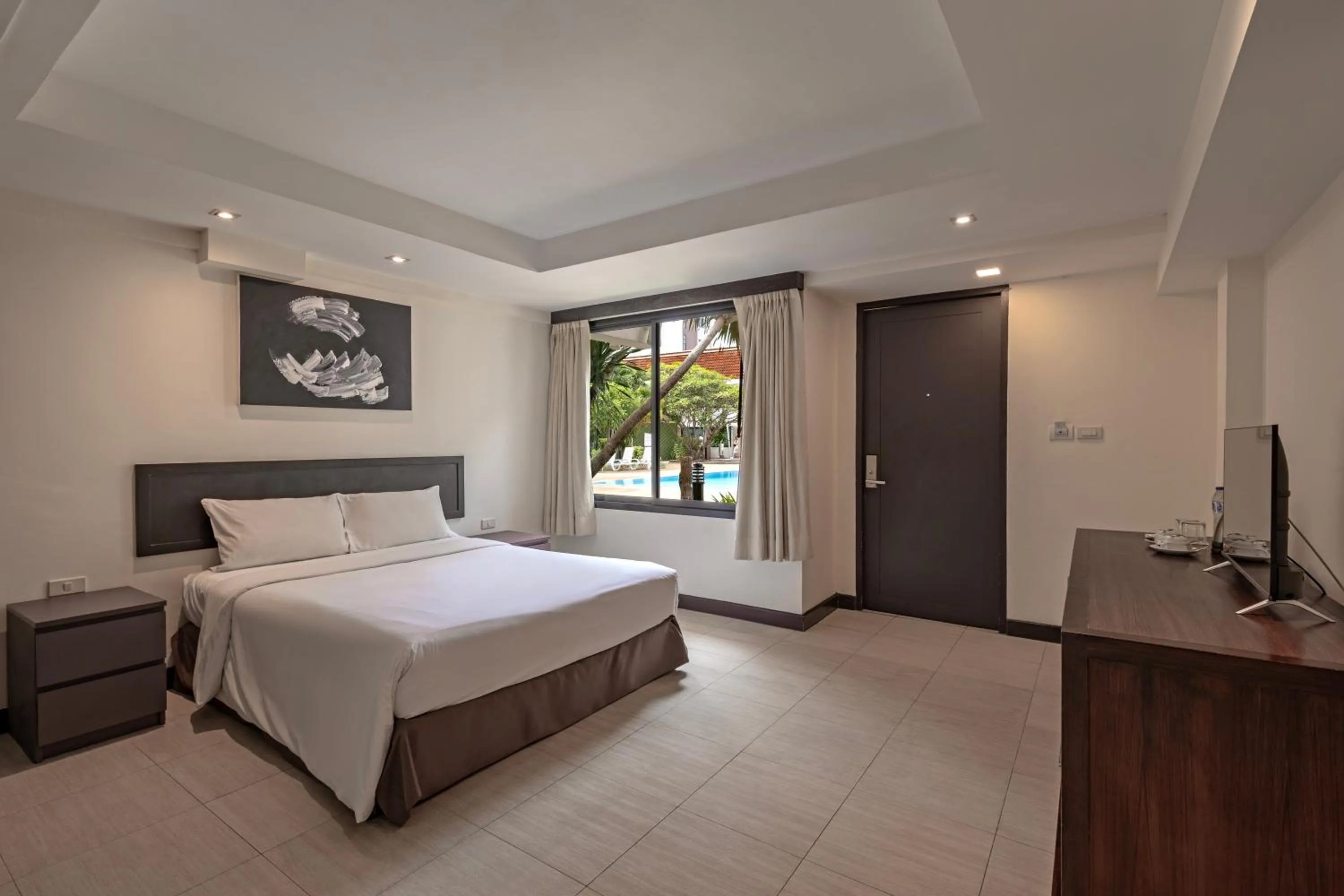 Bed in Hotel Tropicana Pattaya