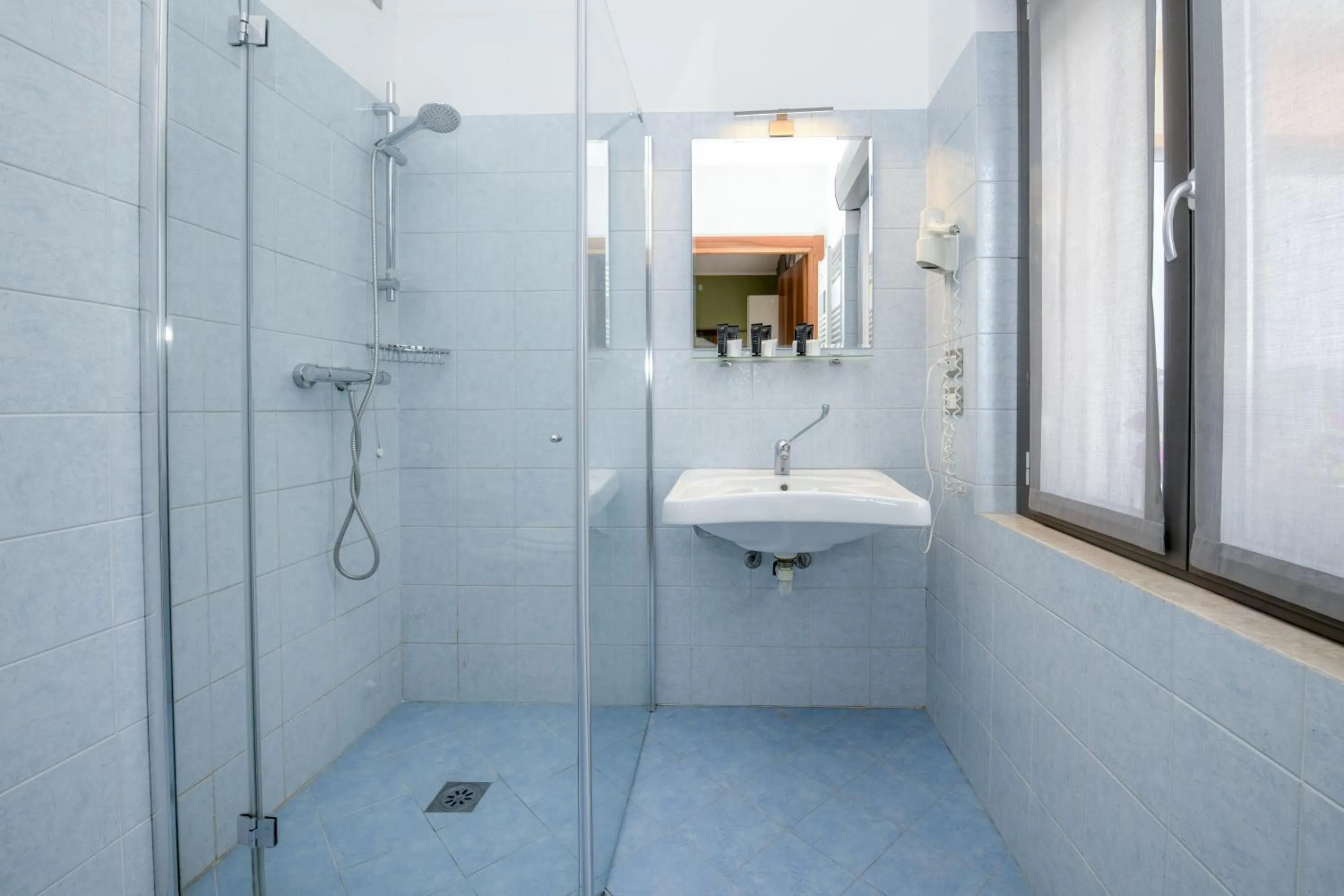 Bathroom in Albergo Locanda Primavera