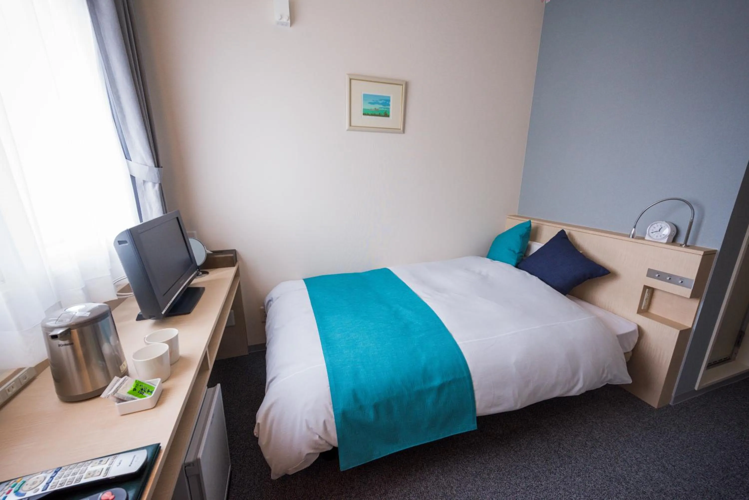 Bed in Tomakomai Hotel Sugita