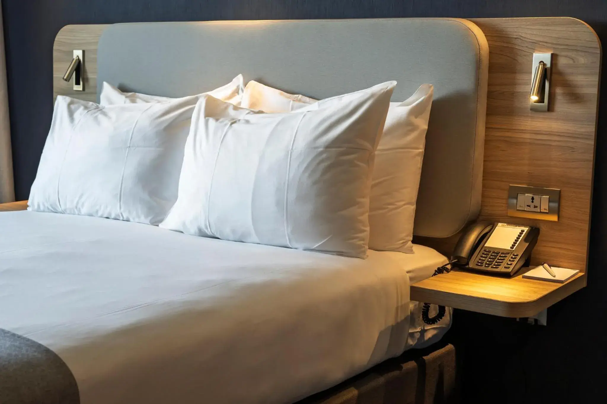 Photo of the whole room, Bed in Holiday Inn Express Geneva Airport by IHG Photo of the whole room, Bed in Holiday Inn Express Geneva Airport by IHG