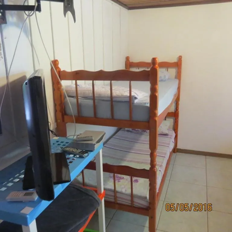 Bed in Pousada Brasil Tropical