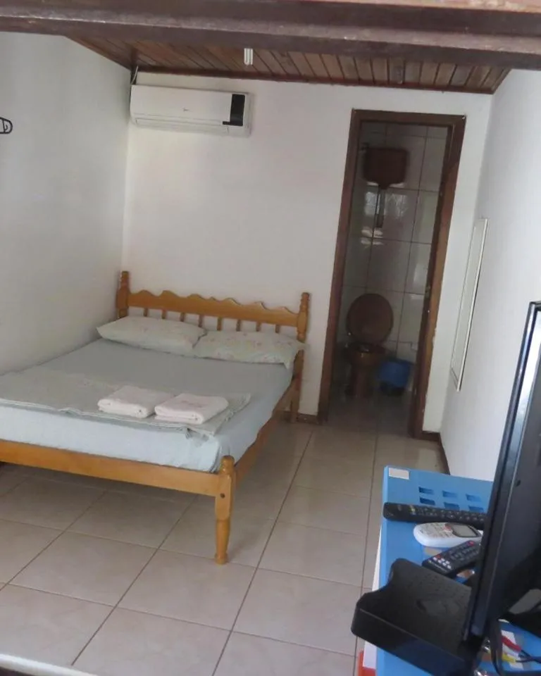 Bed in Pousada Brasil Tropical