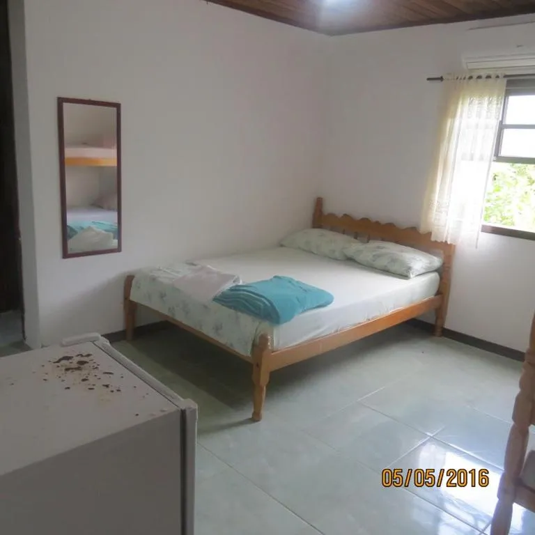 Bed in Pousada Brasil Tropical