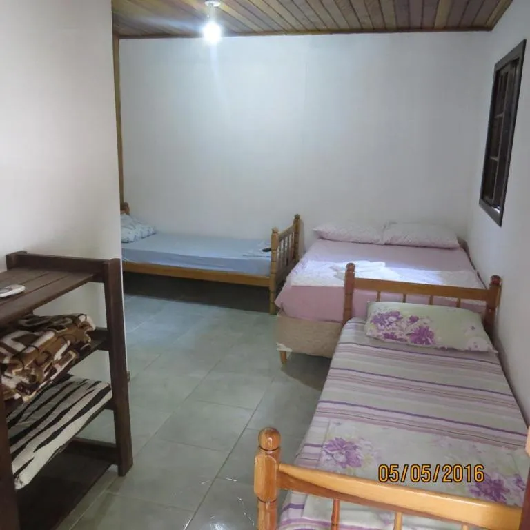 Bed in Pousada Brasil Tropical