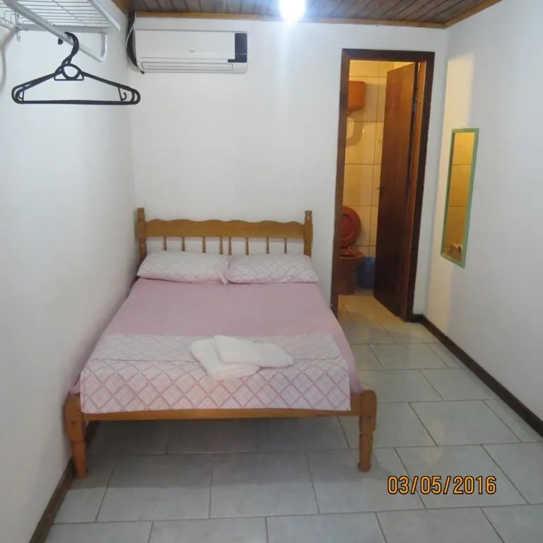 Bed in Pousada Brasil Tropical