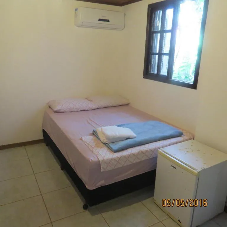Bed in Pousada Brasil Tropical