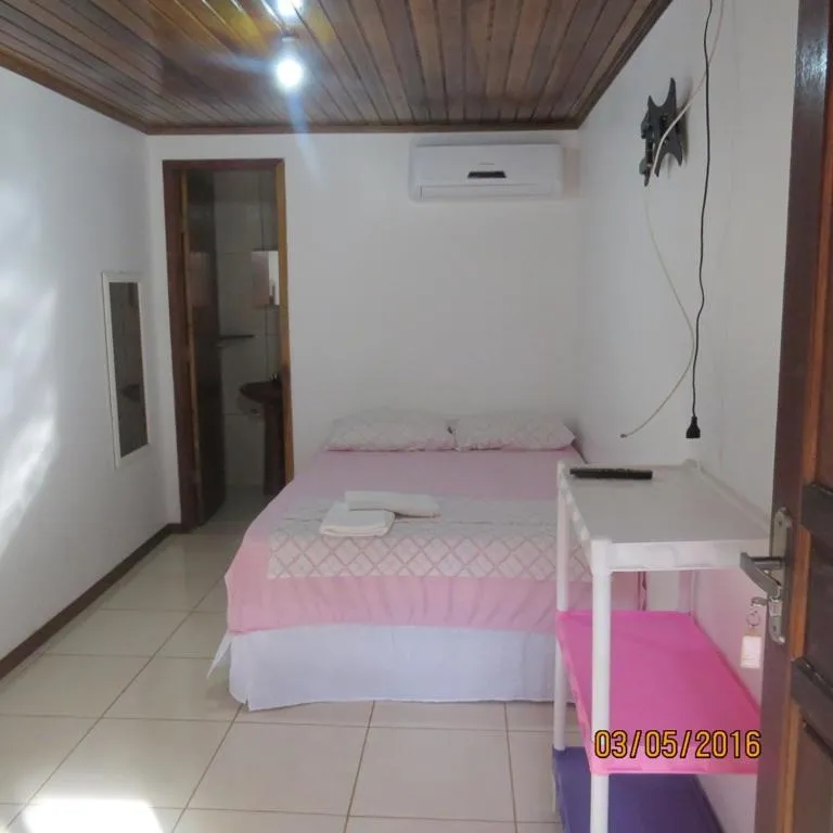Bed in Pousada Brasil Tropical