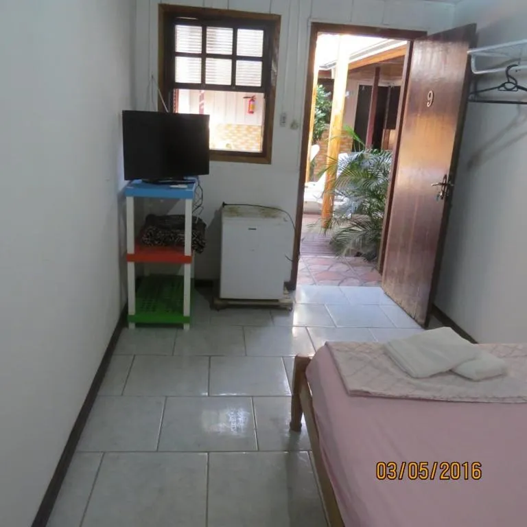 Bed in Pousada Brasil Tropical