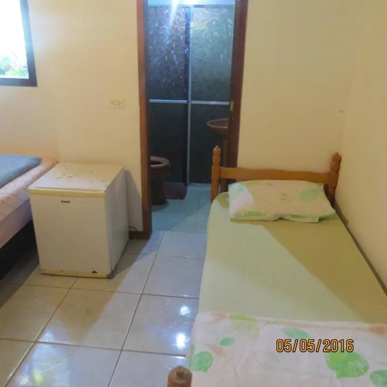 Bed in Pousada Brasil Tropical