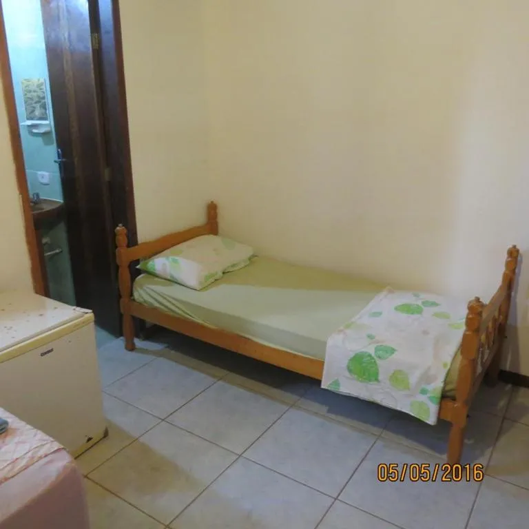 Bed in Pousada Brasil Tropical