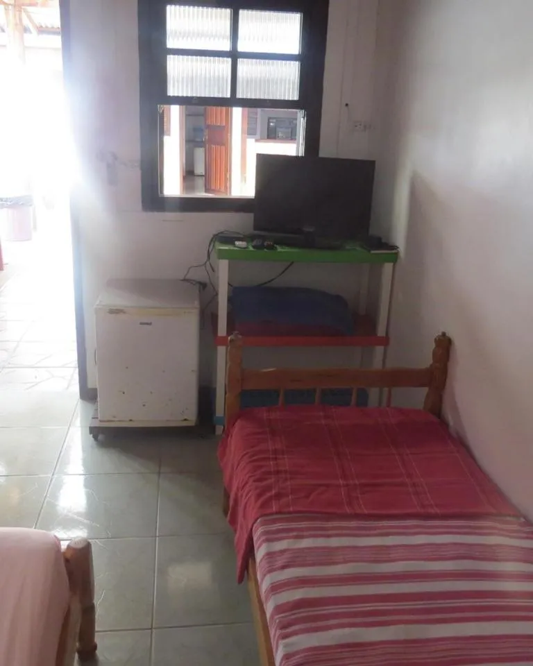Bed in Pousada Brasil Tropical