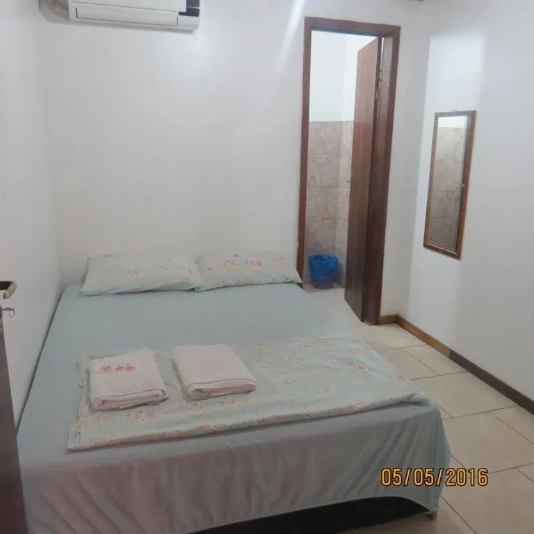 Bed in Pousada Brasil Tropical