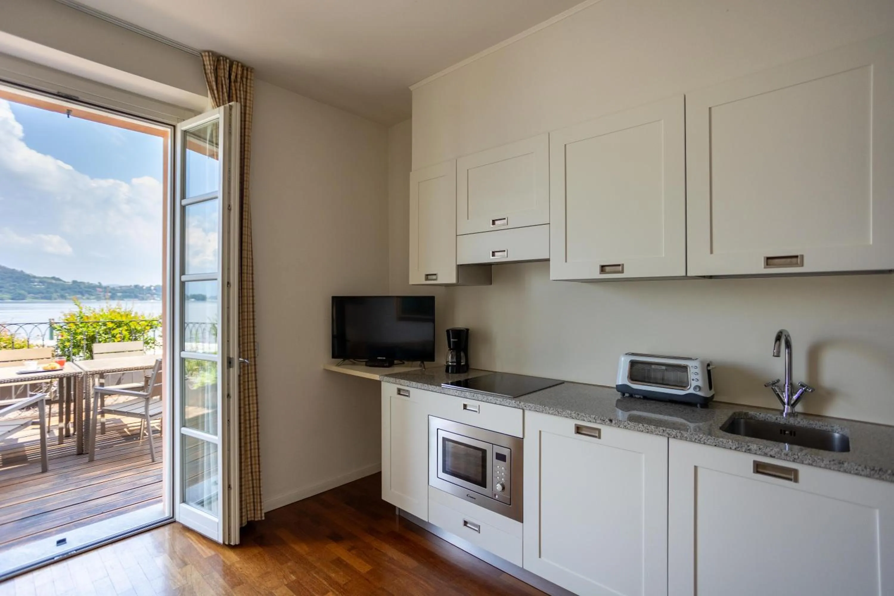 Kitchen or kitchenette in Resort Antico Verbano