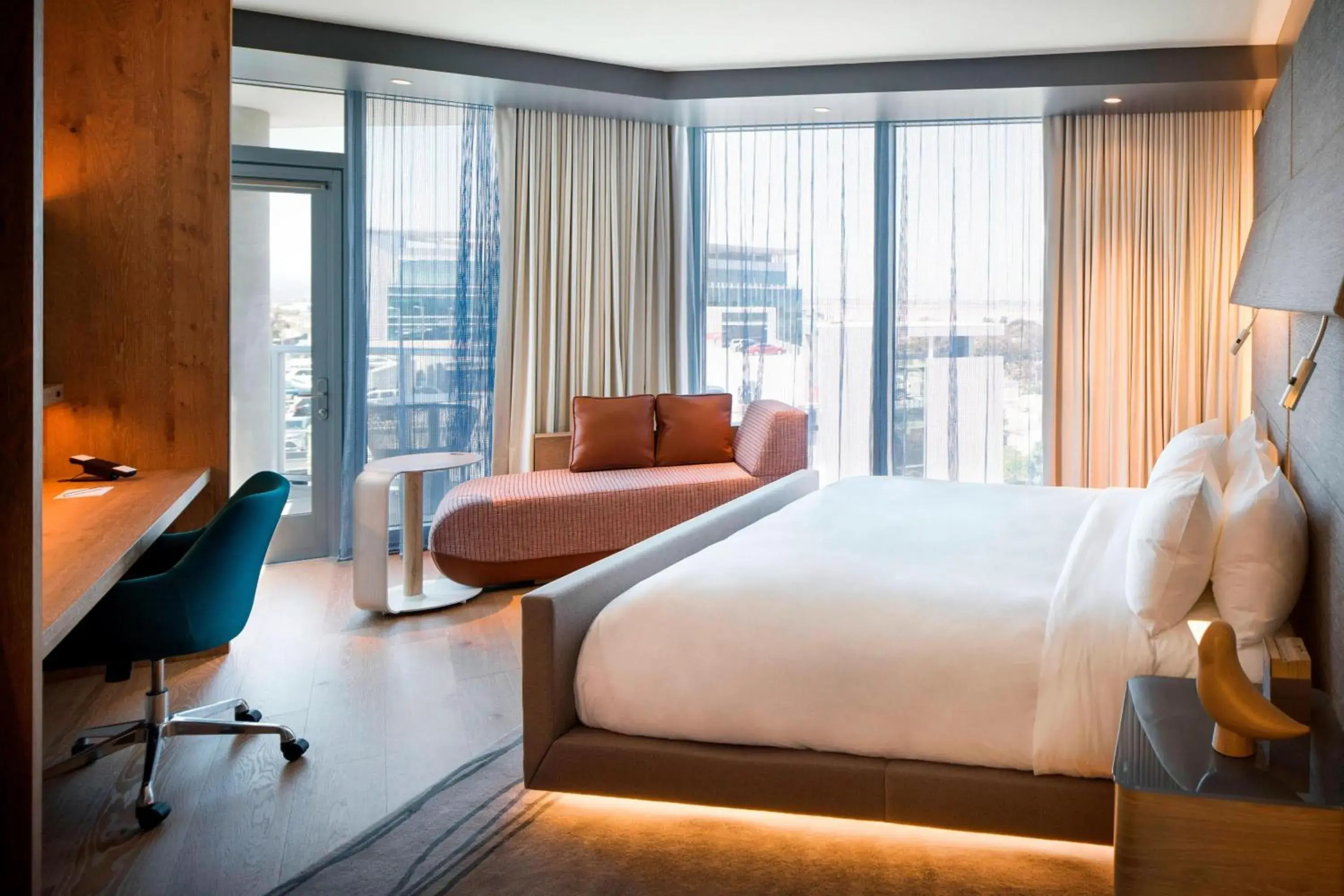 Corner King Guest Room with Balcony and Partial Bay View in Hotel Nia, Autograph Collection Corner King Guest Room with Balcony and Partial Bay View in Hotel Nia, Autograph Collection