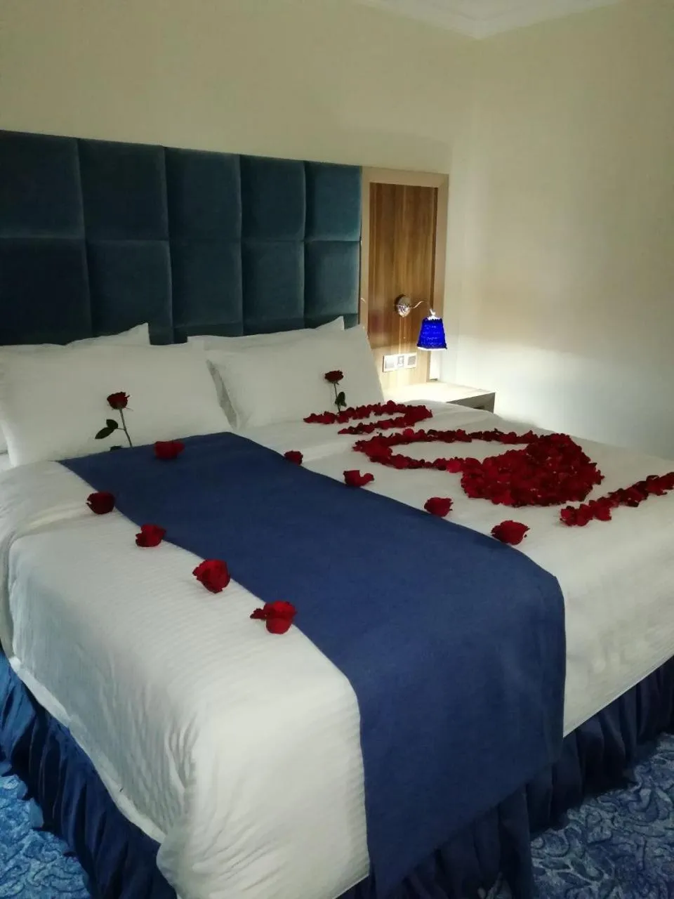 Bed in Swiss Blue serviced Apartments- Al Zahra