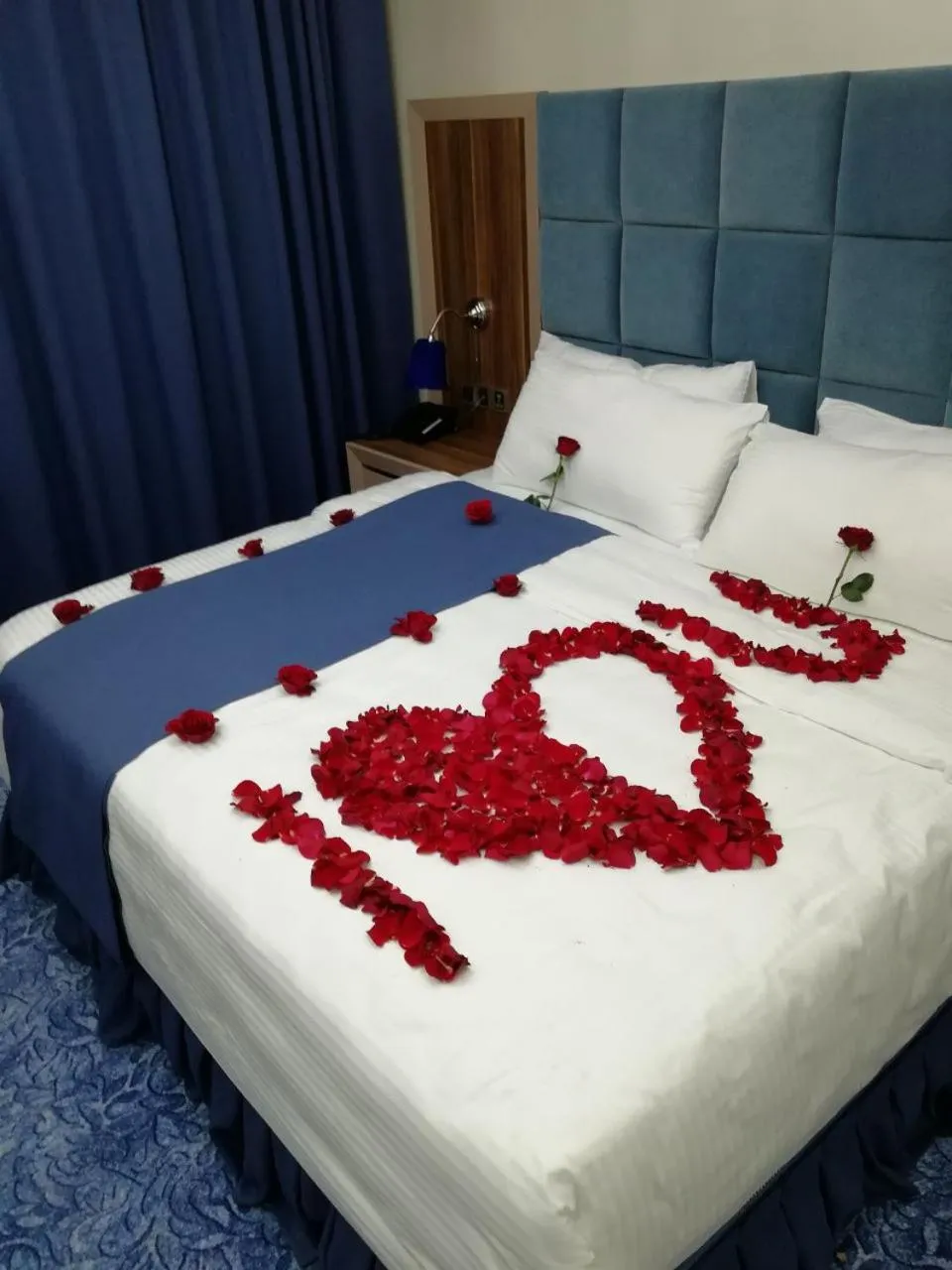 Bed in Swiss Blue serviced Apartments- Al Zahra