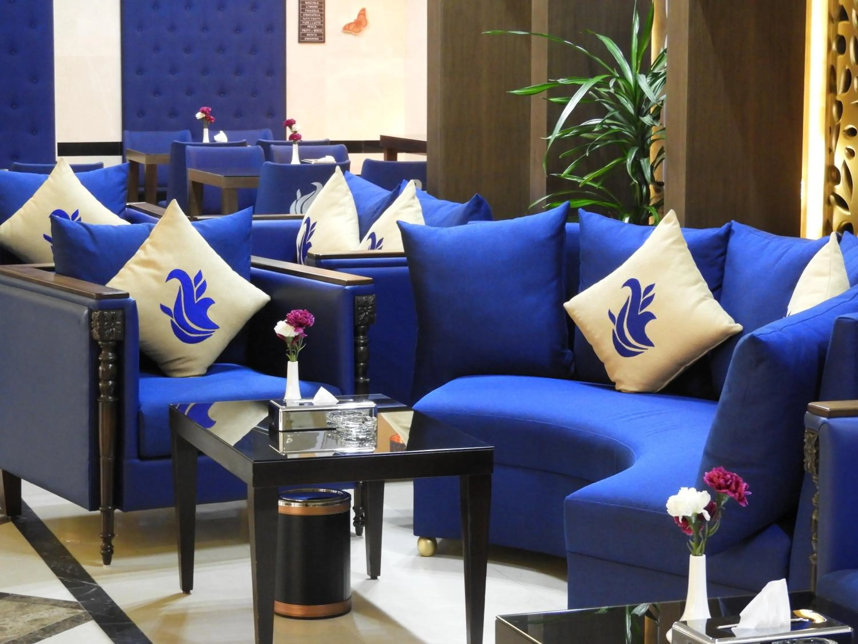 Seating area in Swiss Blue serviced Apartments- Al Zahra