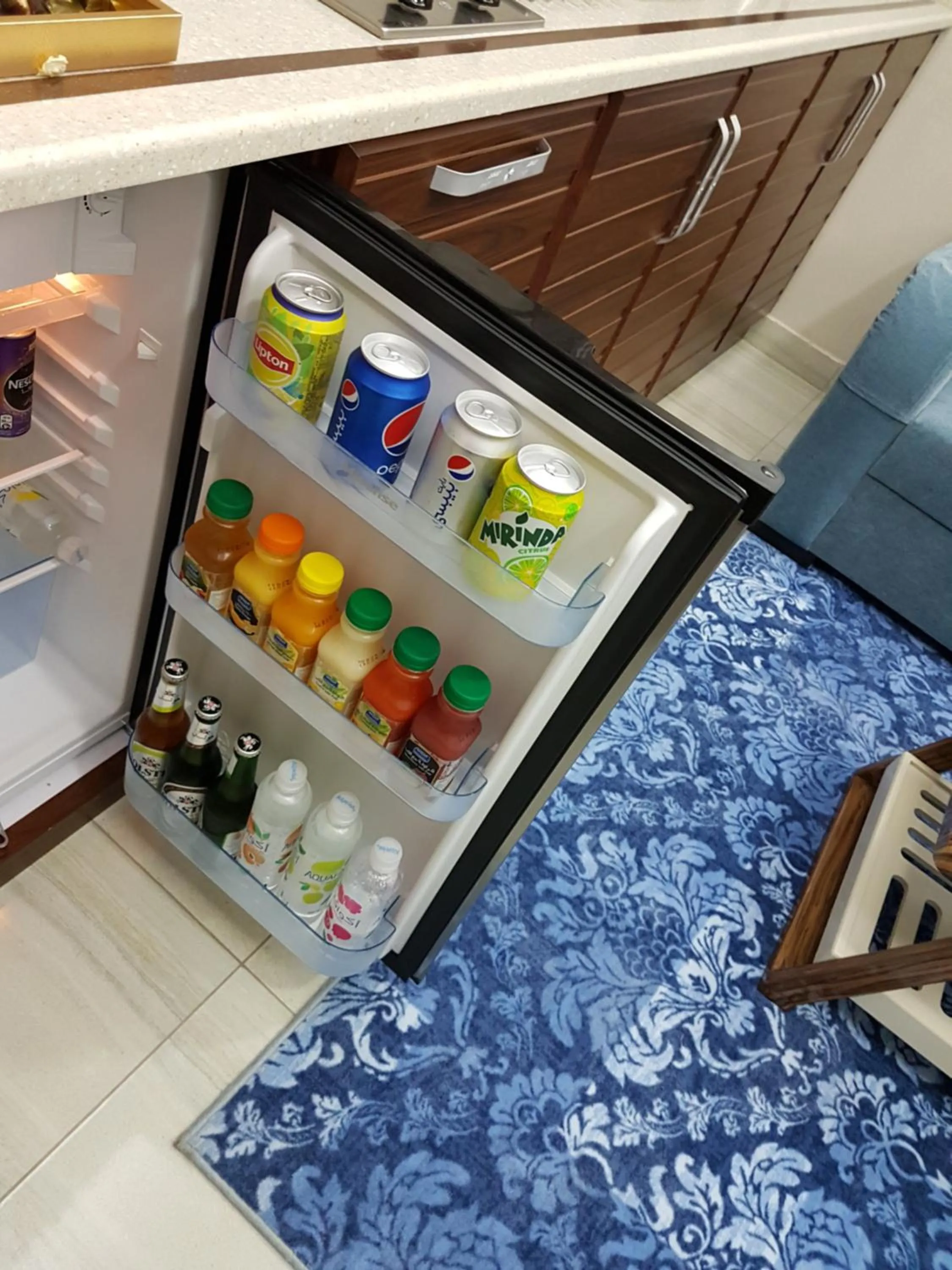 Drinks in Swiss Blue serviced Apartments- Al Zahra