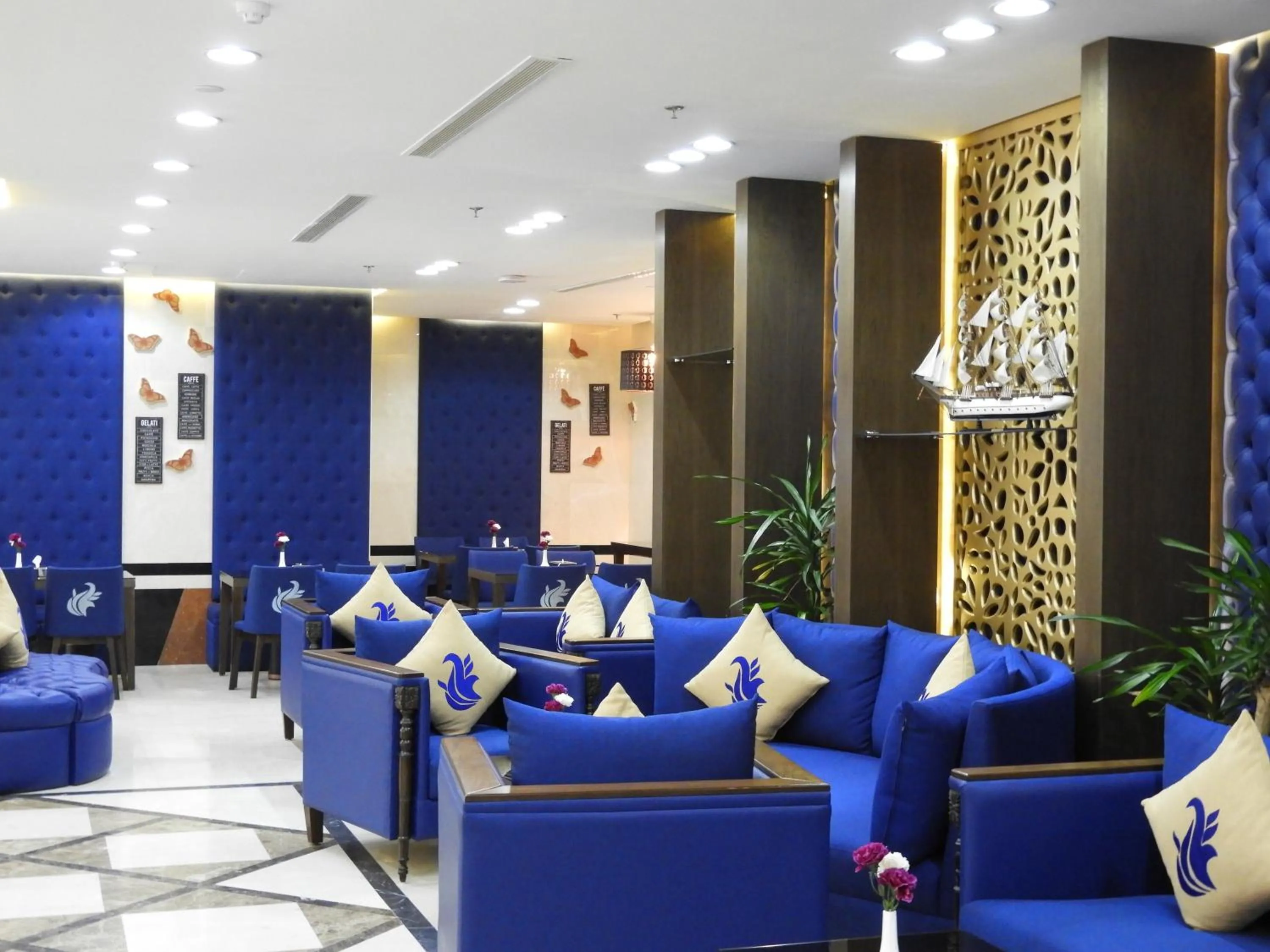 Seating area in Swiss Blue serviced Apartments- Al Zahra