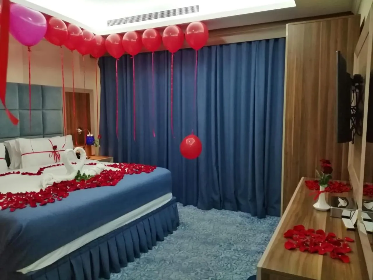 Bed in Swiss Blue serviced Apartments- Al Zahra