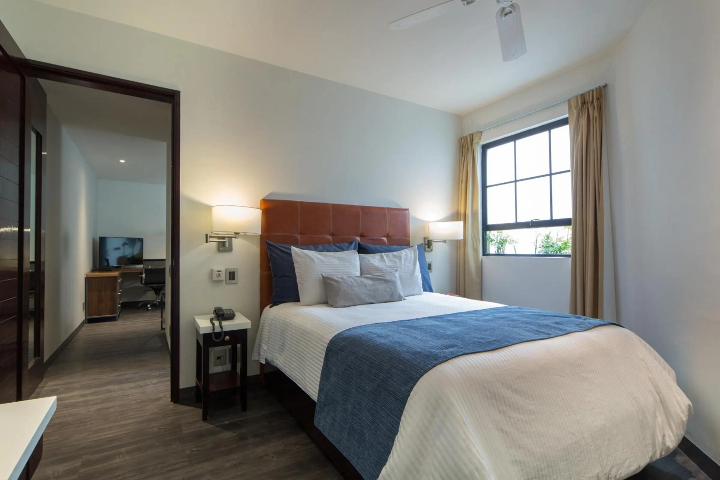 Bed in FlowSuites Polanco