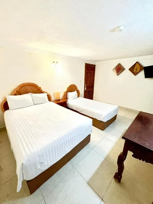 Bed in Suites Cancun Center