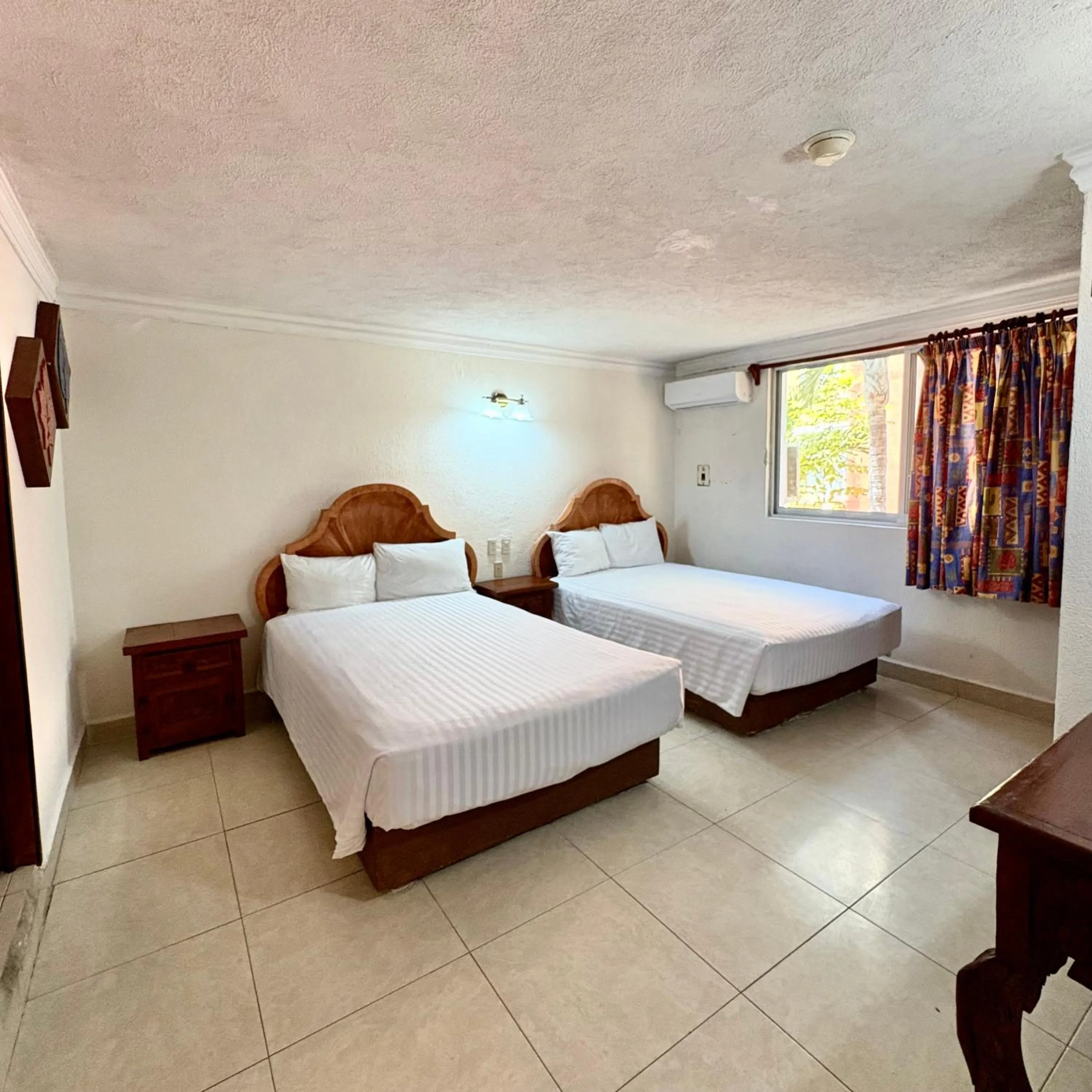 Bed in Suites Cancun Center