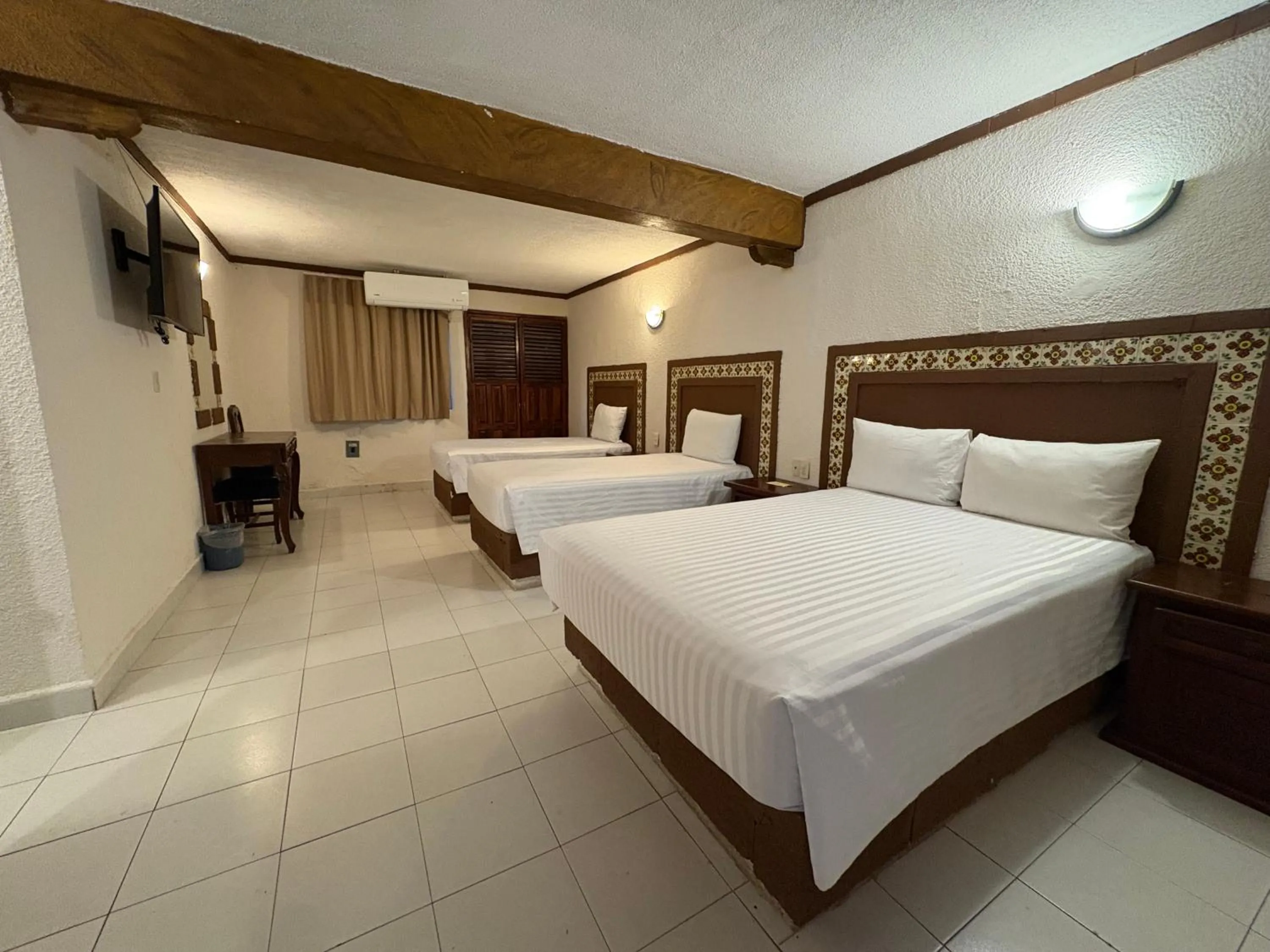 Bed in Suites Cancun Center