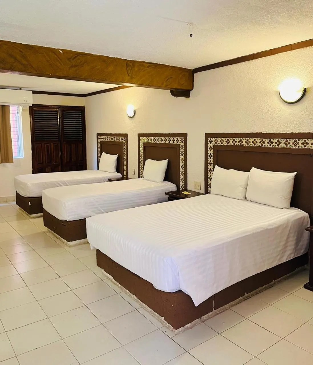 Bed in Suites Cancun Center