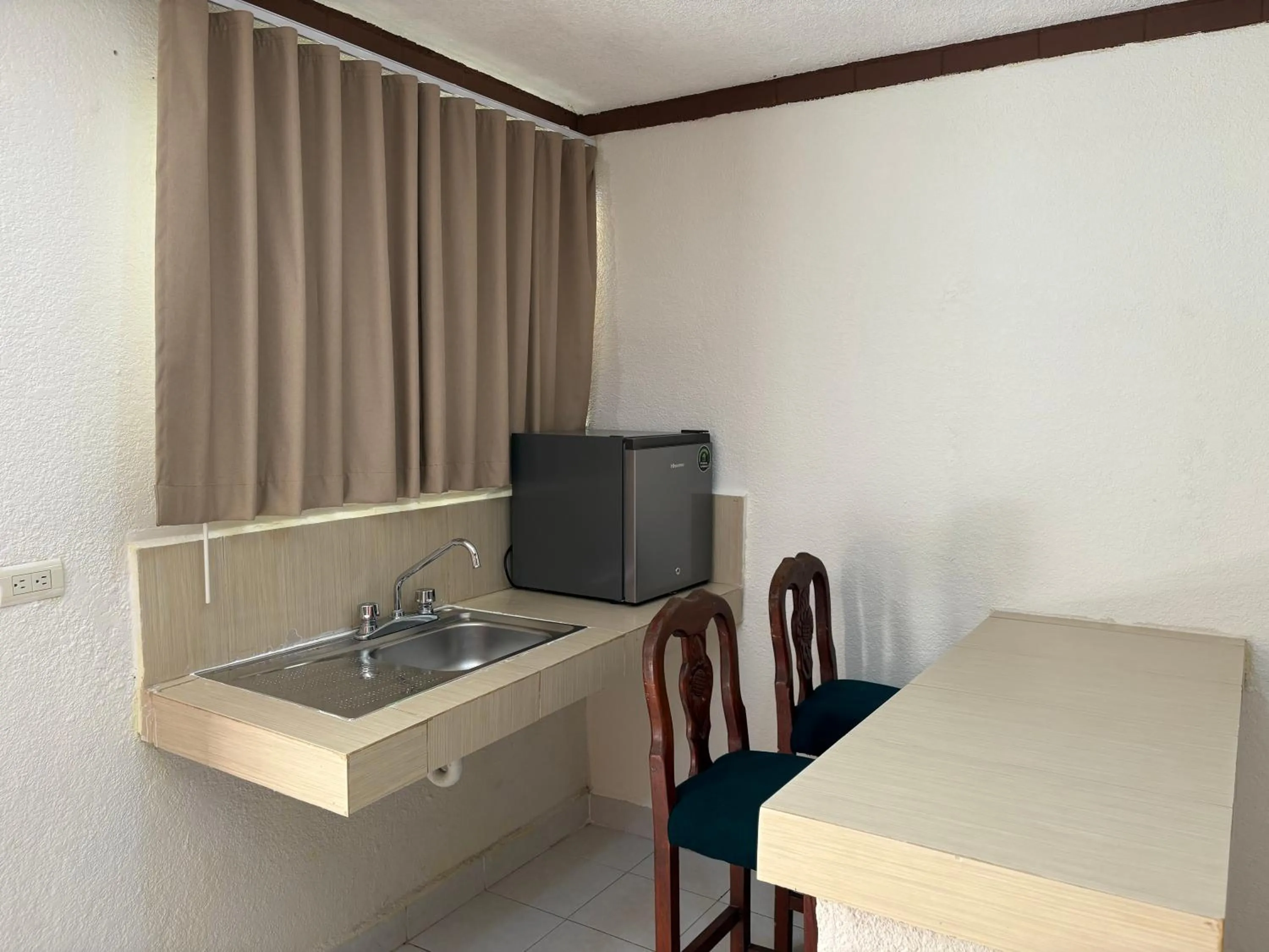 Photo of the whole room in Suites Cancun Center