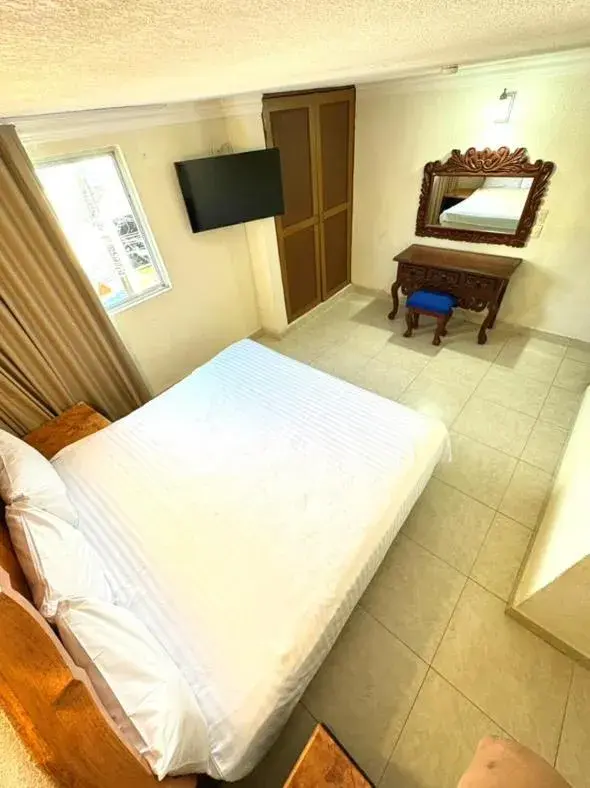 Photo of the whole room, Bed in Suites Cancun Center Photo of the whole room, Bed in Suites Cancun Center